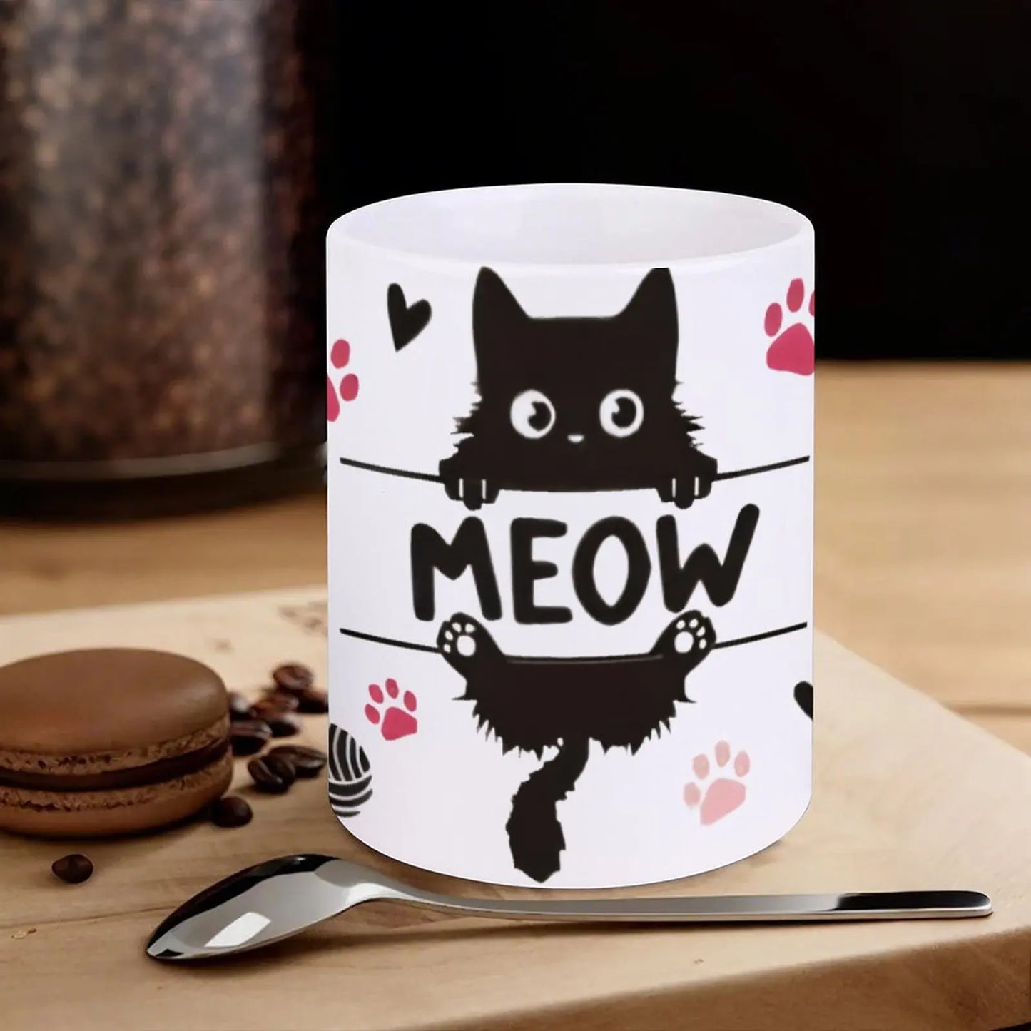 Black Cat Sitting On Top Of A Bar With Paw Prints And The Word Meow Cup